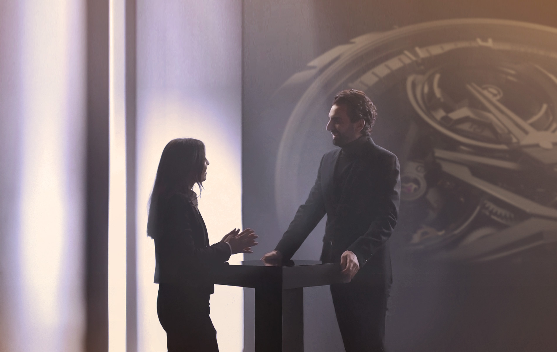 a person and person standing next to each other