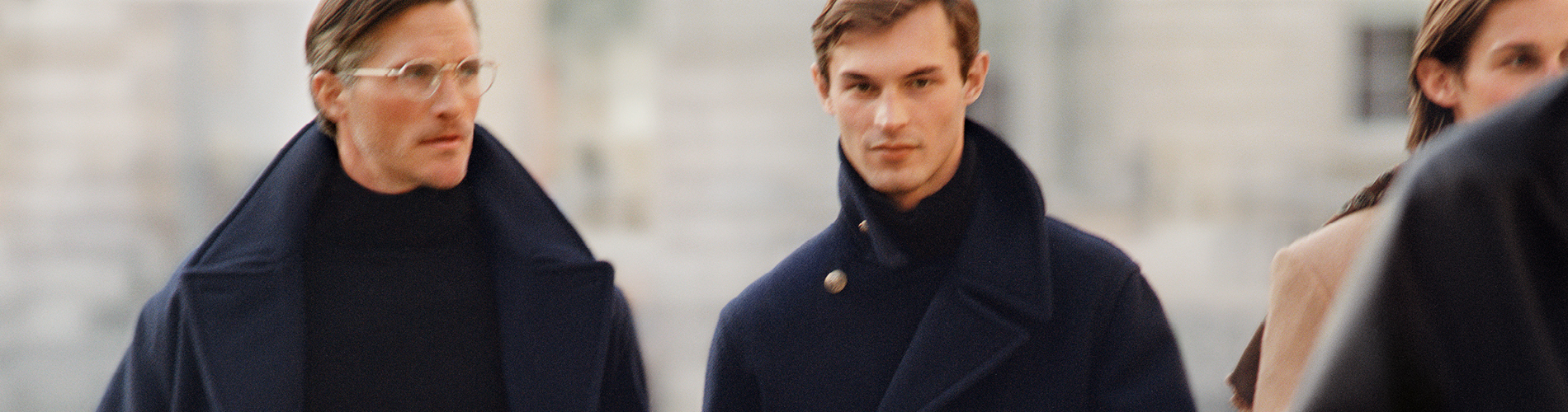 a person in a blue coat