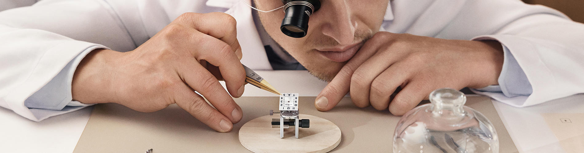 a person looking through a magnifying glass