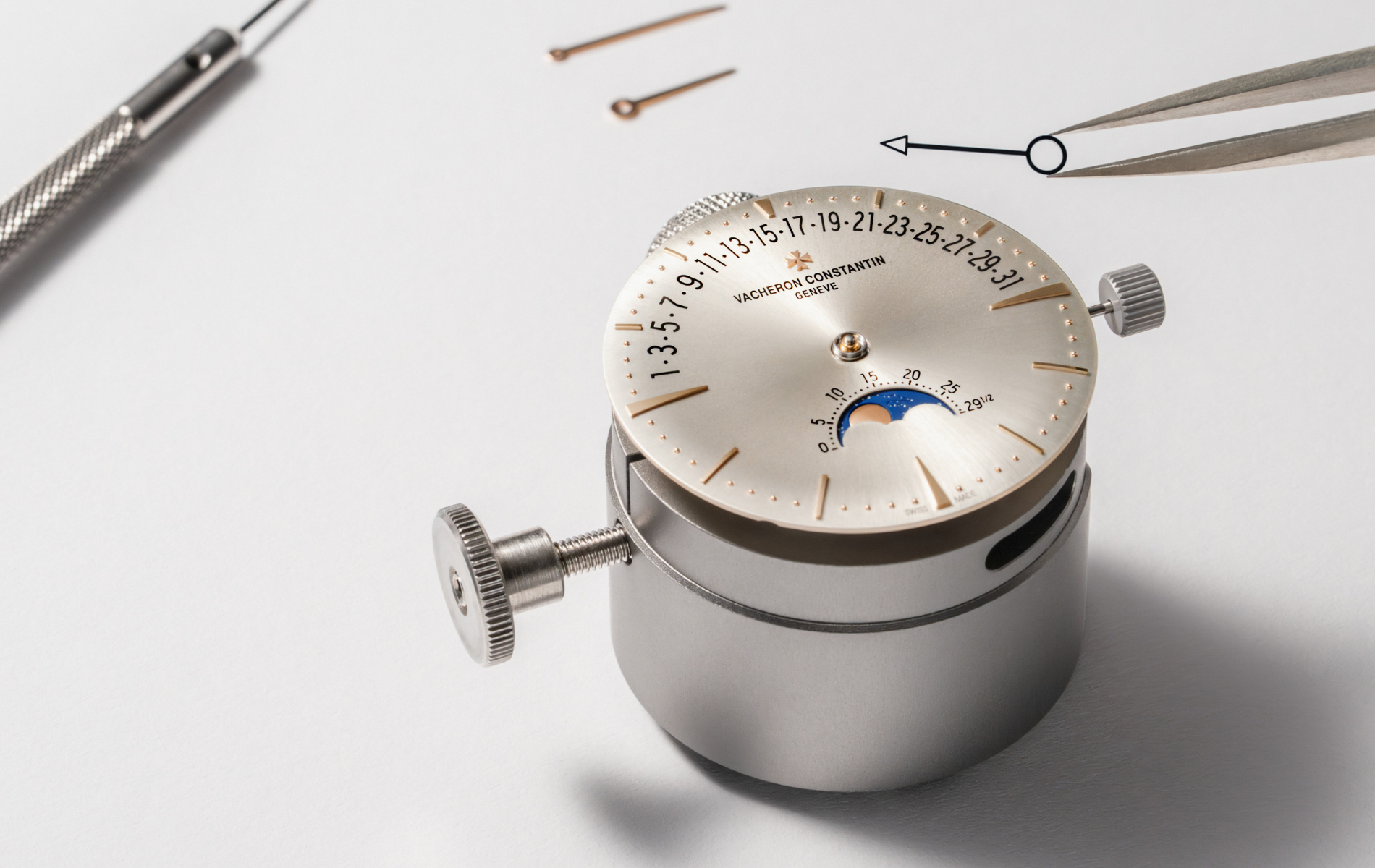 a silver and gold watch dial