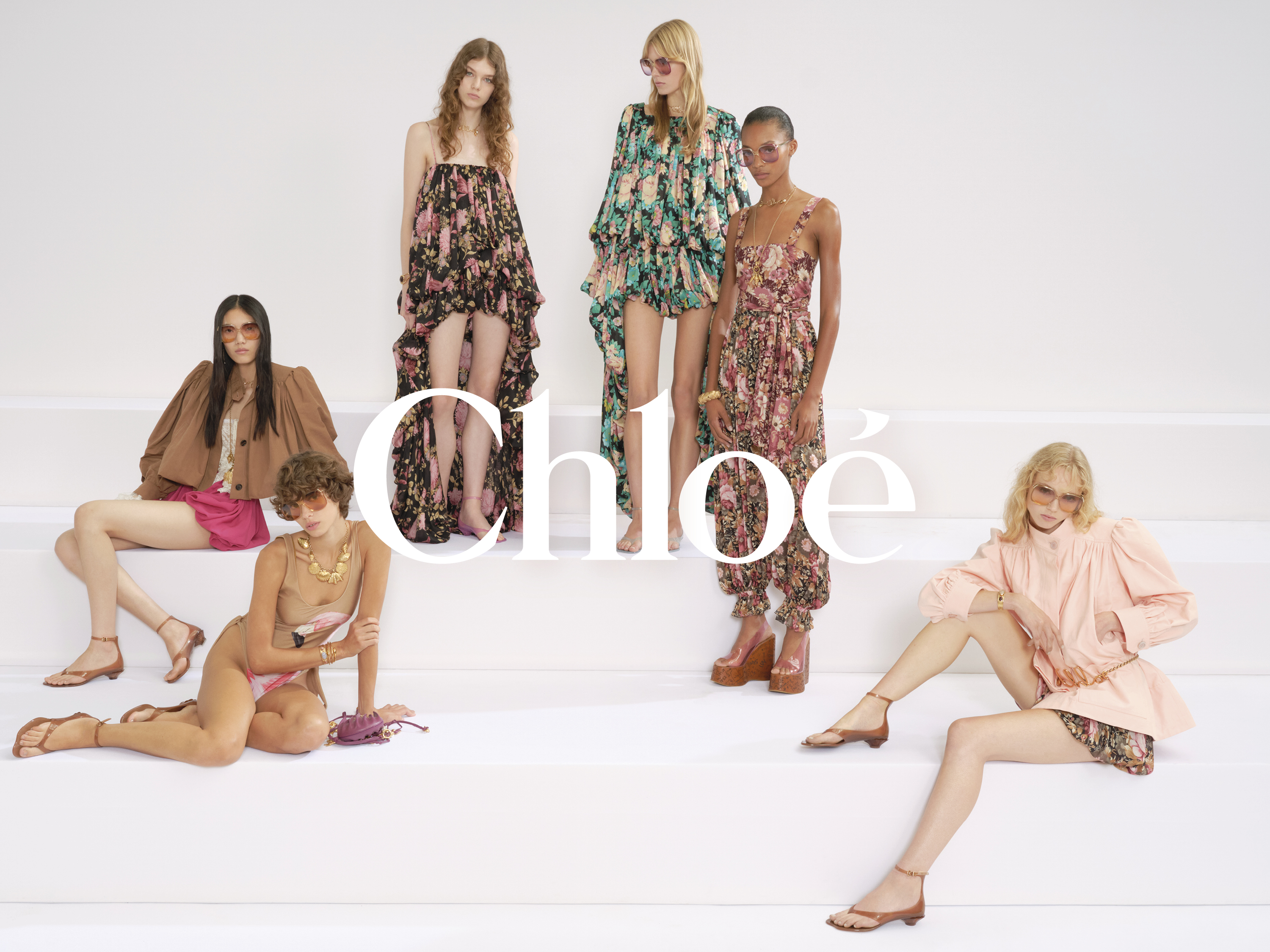 a group of women posing for a photo