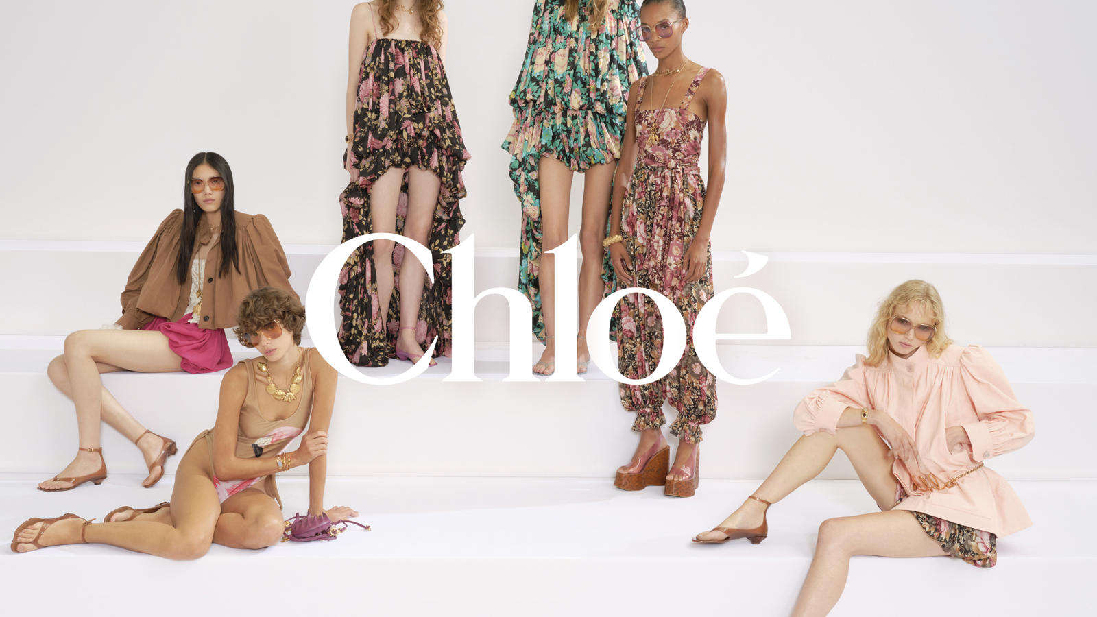 a group of women posing for a photo