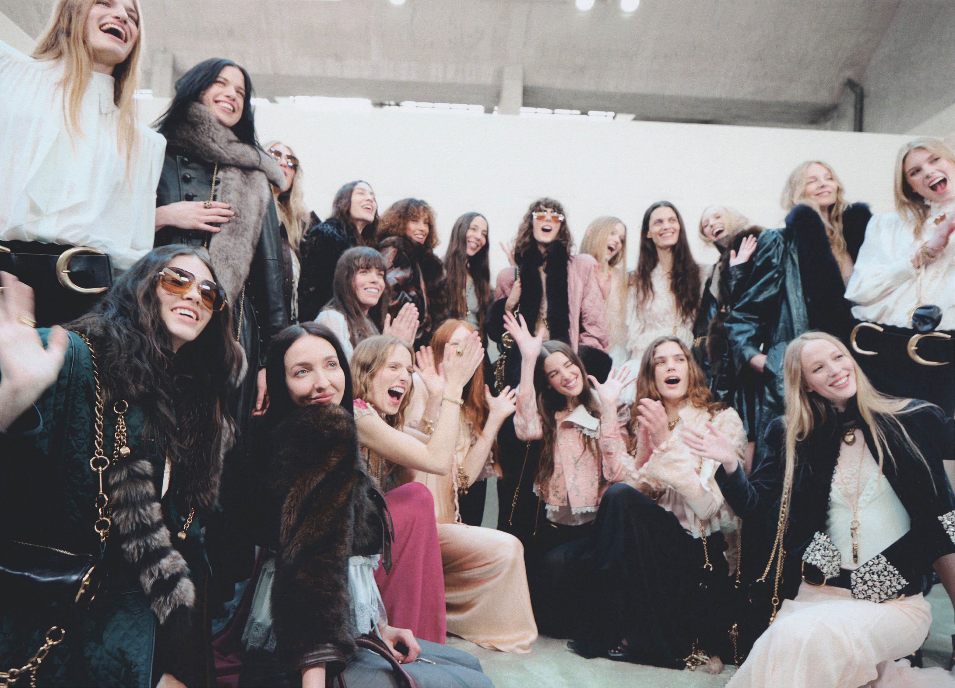 a group of women posing for a photo