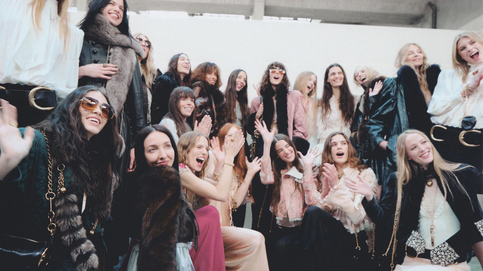 a group of women posing for a photo